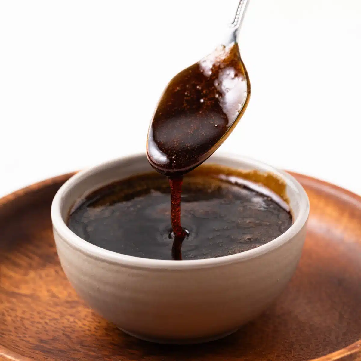 Kecap manis on a spoon.