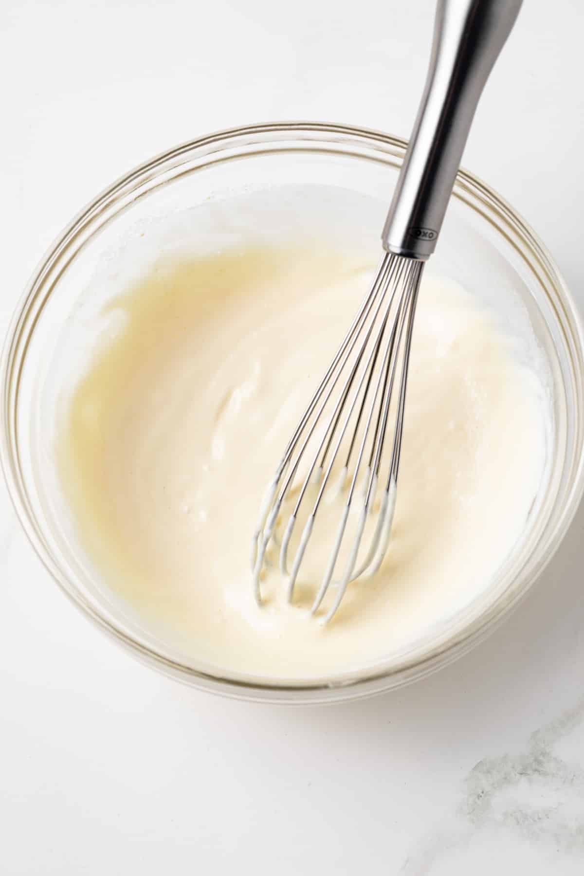 Artichoke sauce in a glass bowl.