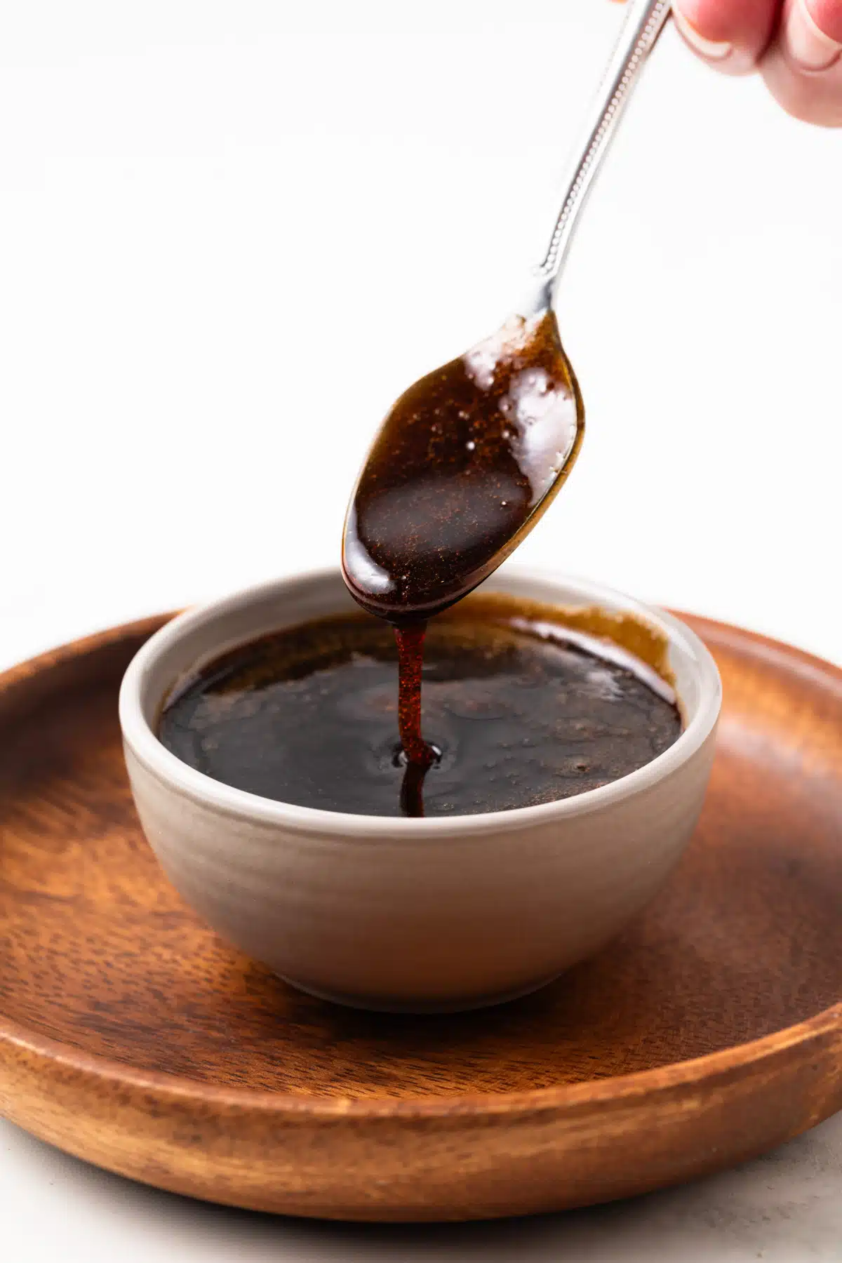 Kecap manis on a spoon.