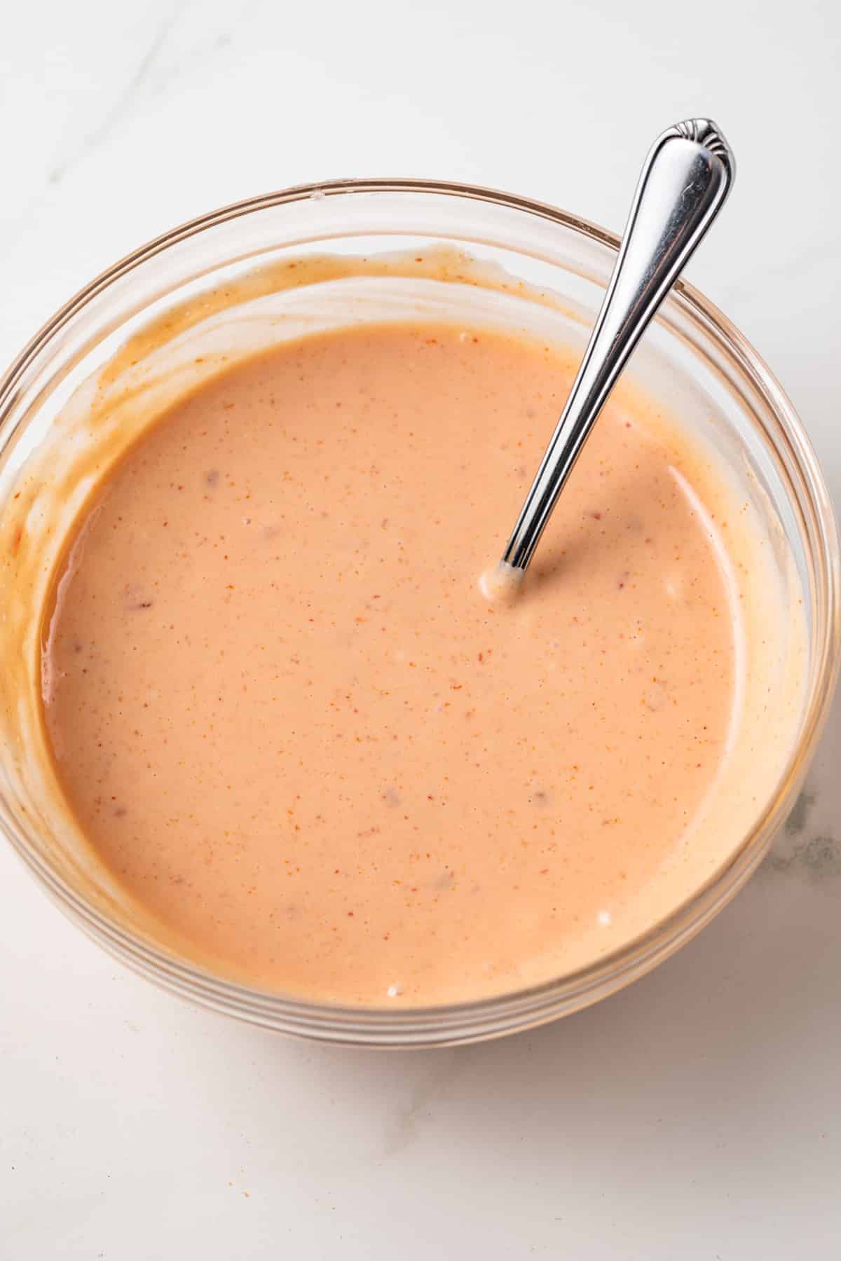 Boom boom sauce in glass bowl.