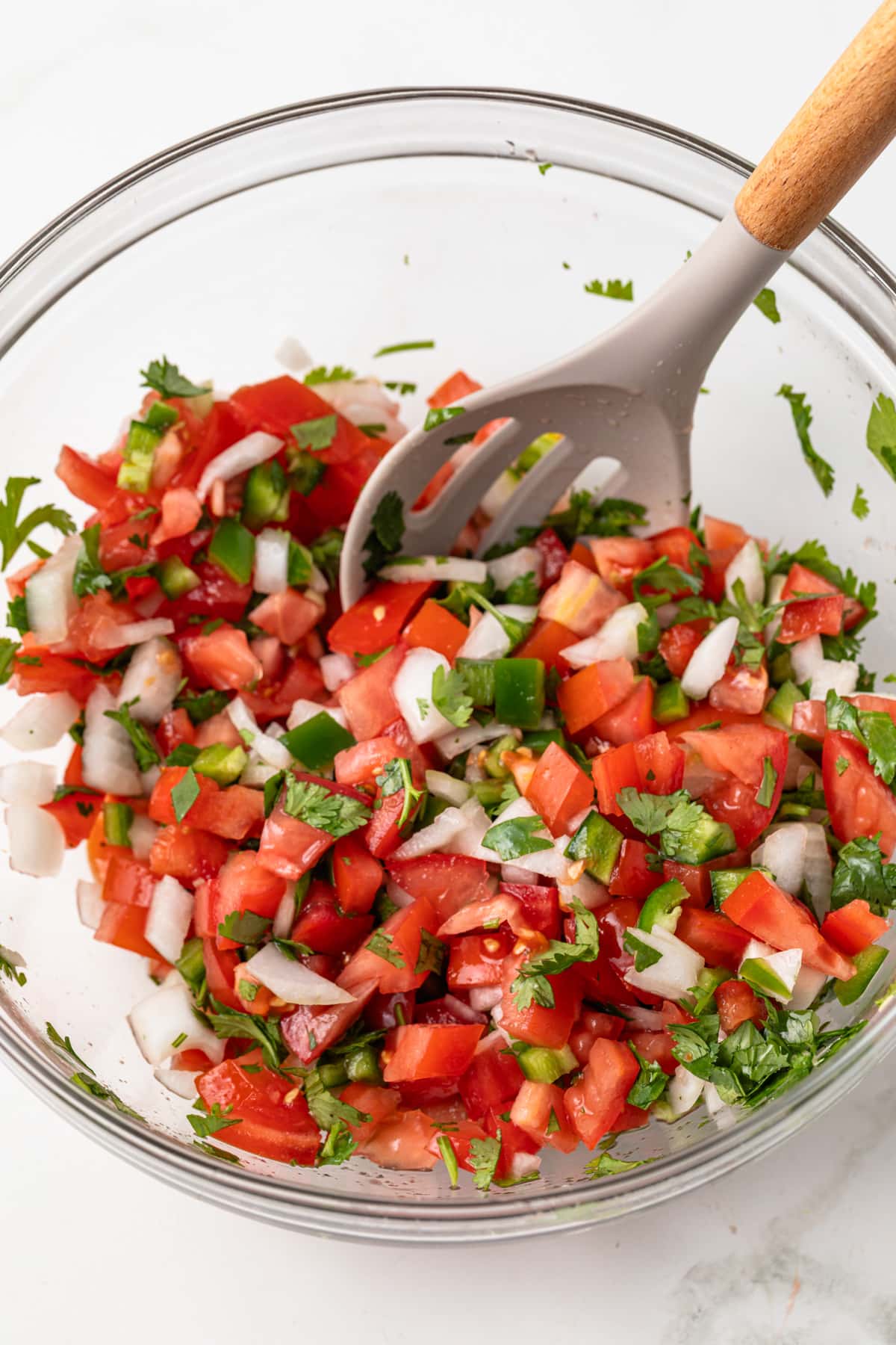 Pico de Gallo in a glass bowl.