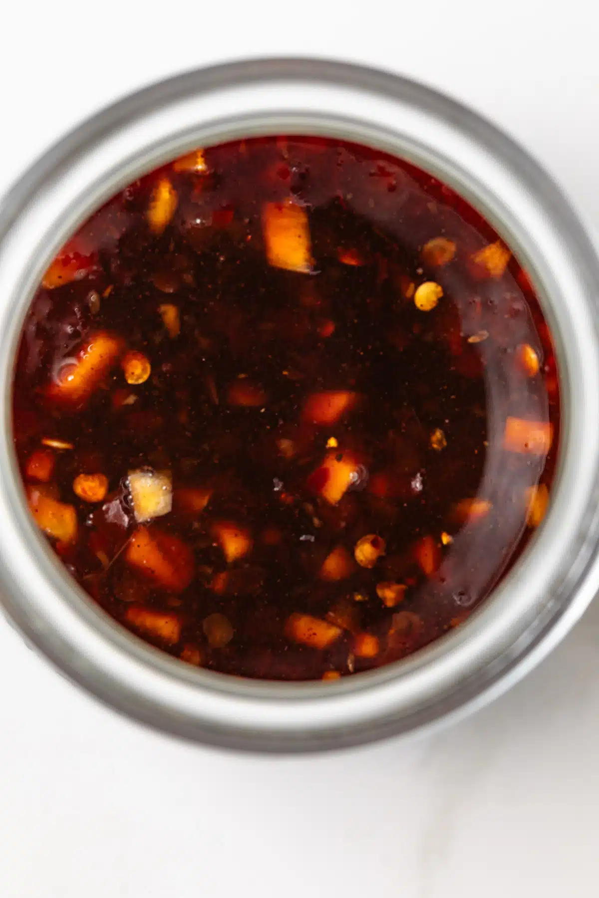 Szechuan sauce in a glass jar.