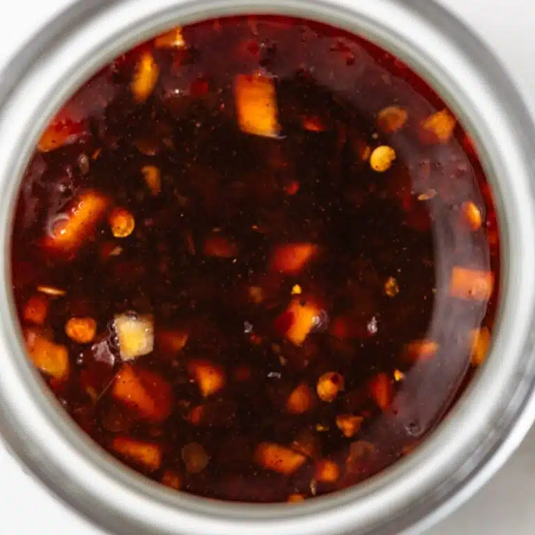 Szechuan sauce in a glass jar.