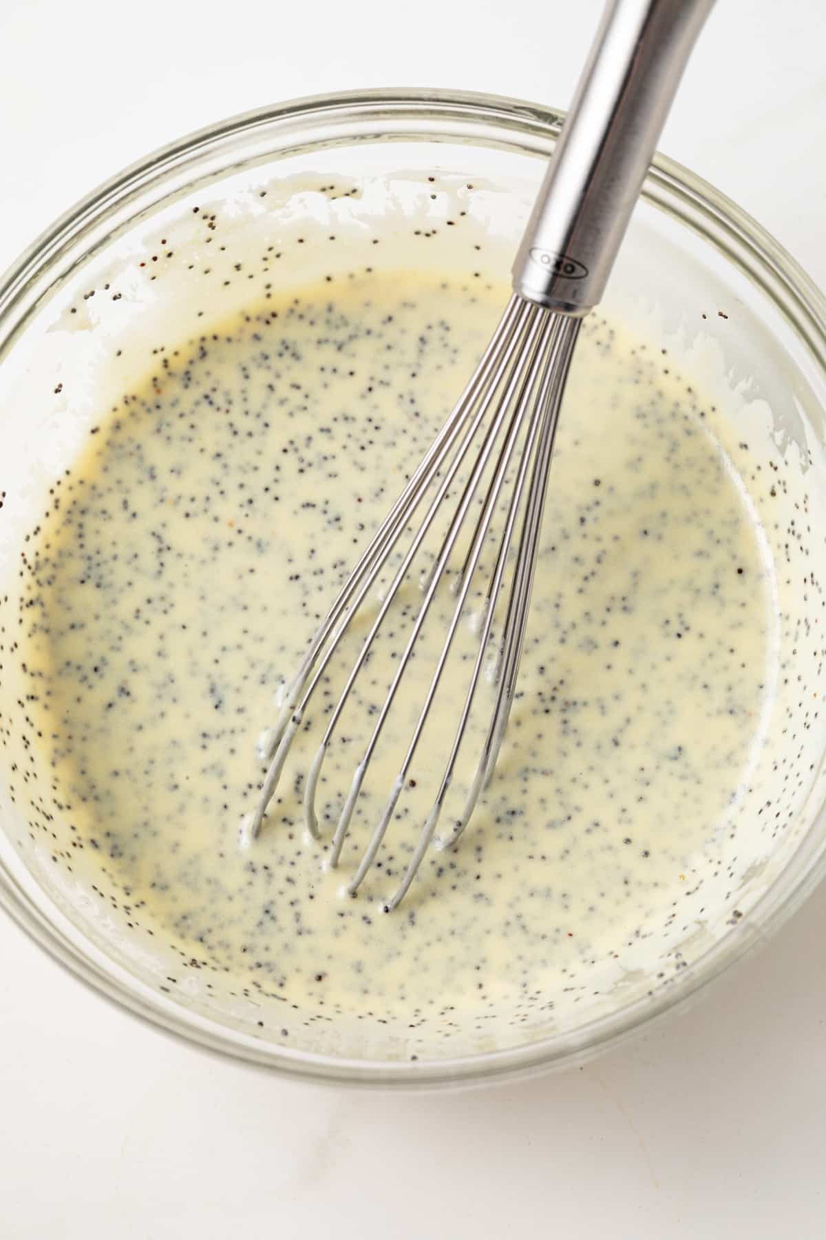 Poppy seed dressing in a bowl.