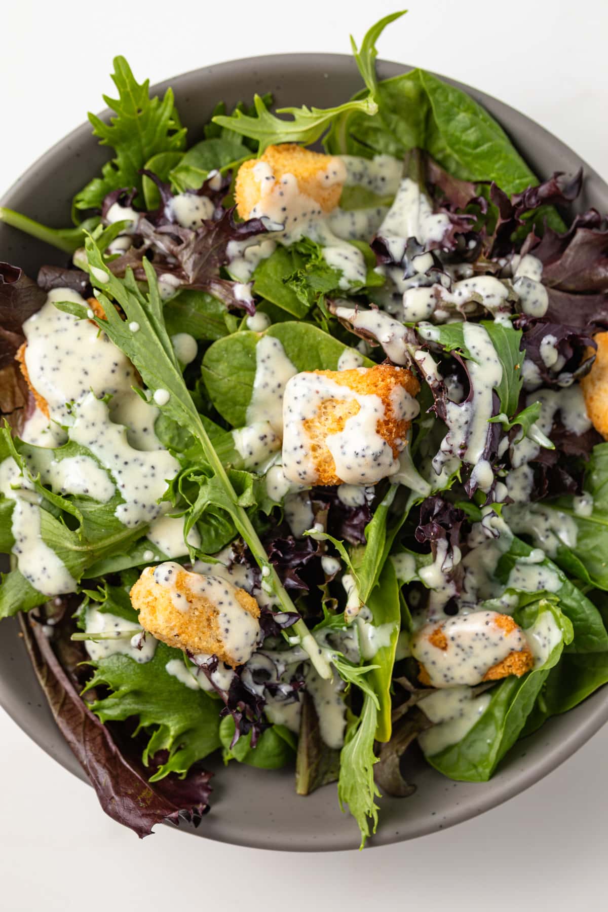 Salad with creamy poppy seed dressing.