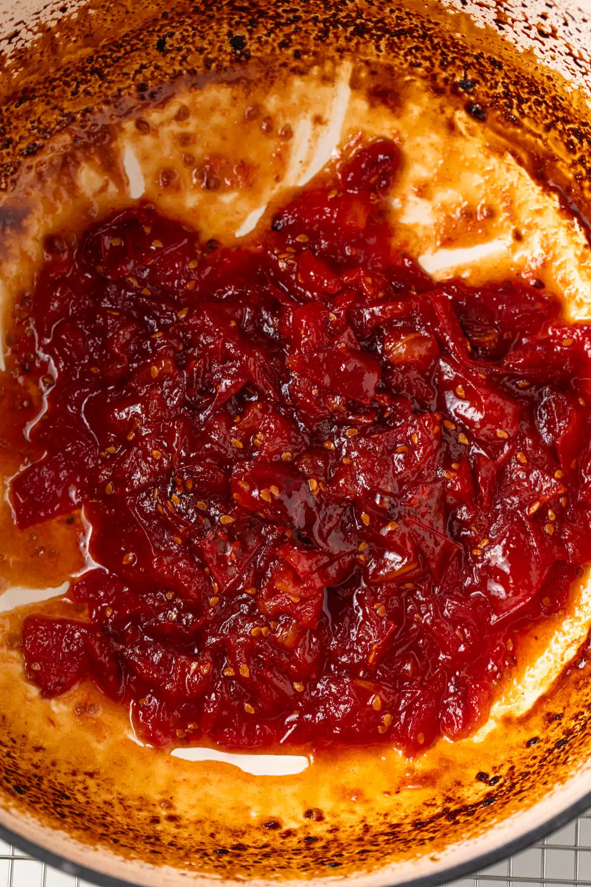 Roasted tomato jam cooked in a pot.