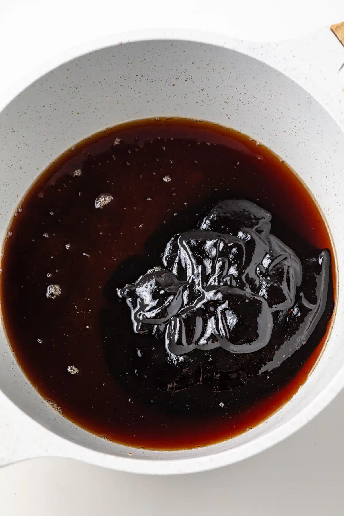 Ingredients for Pad Thai sauce in a saucepan.