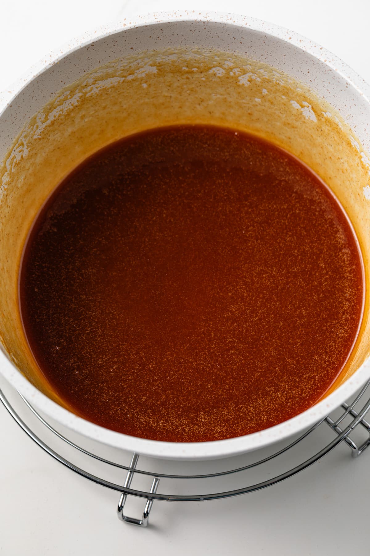 Buttermilk caramel sauce in a saucepan.