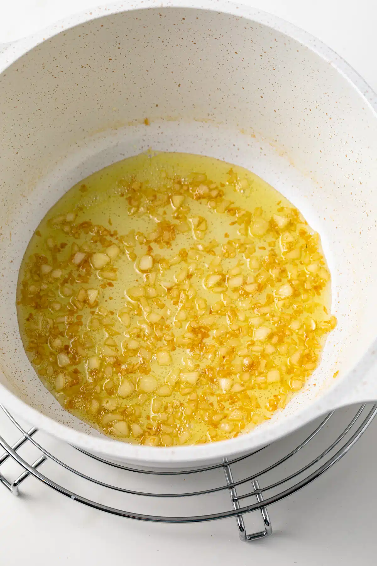 Sauteed onions in oil in a saucepan.