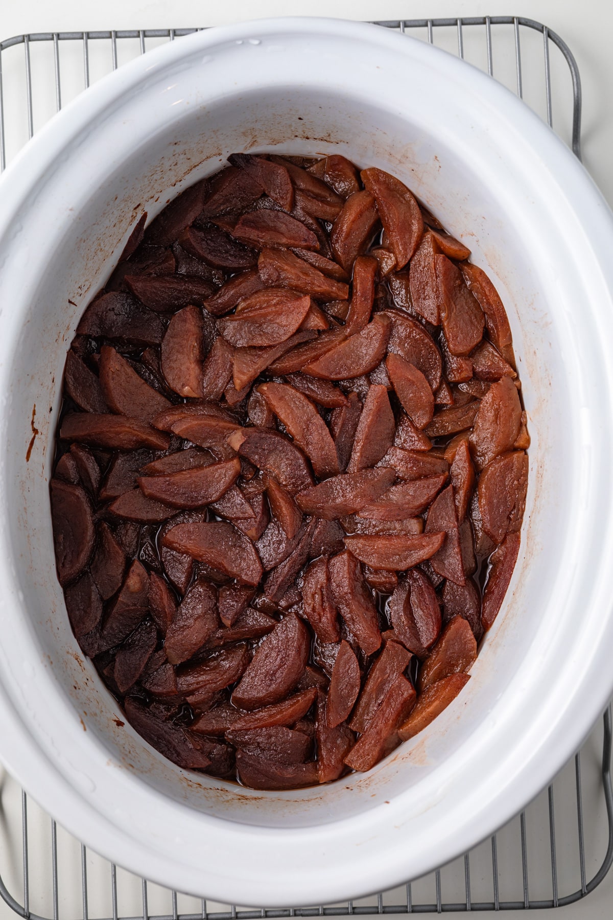 Apples cooked in a slow cooker.