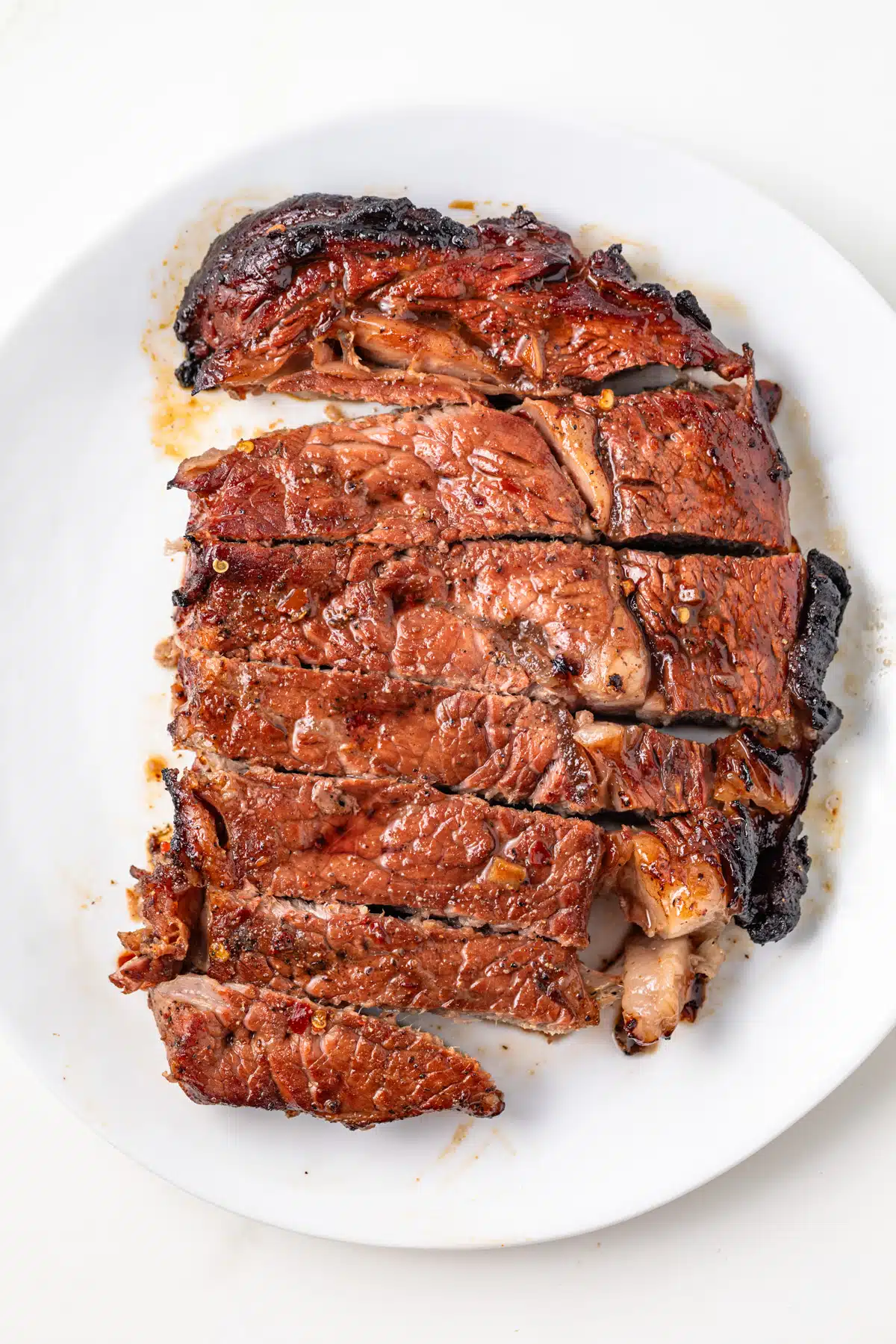 Grilled steaks marinated in spicy steak marinade.