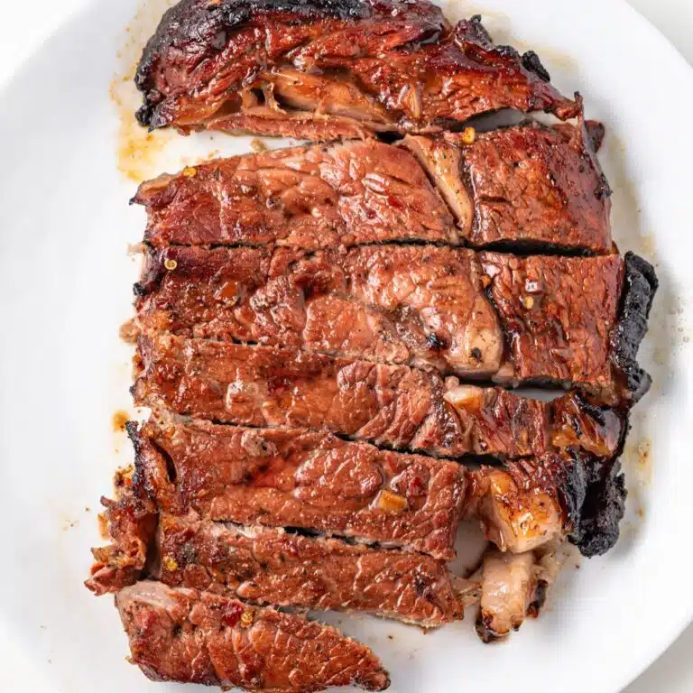Grilled steaks marinated in spicy steak marinade.
