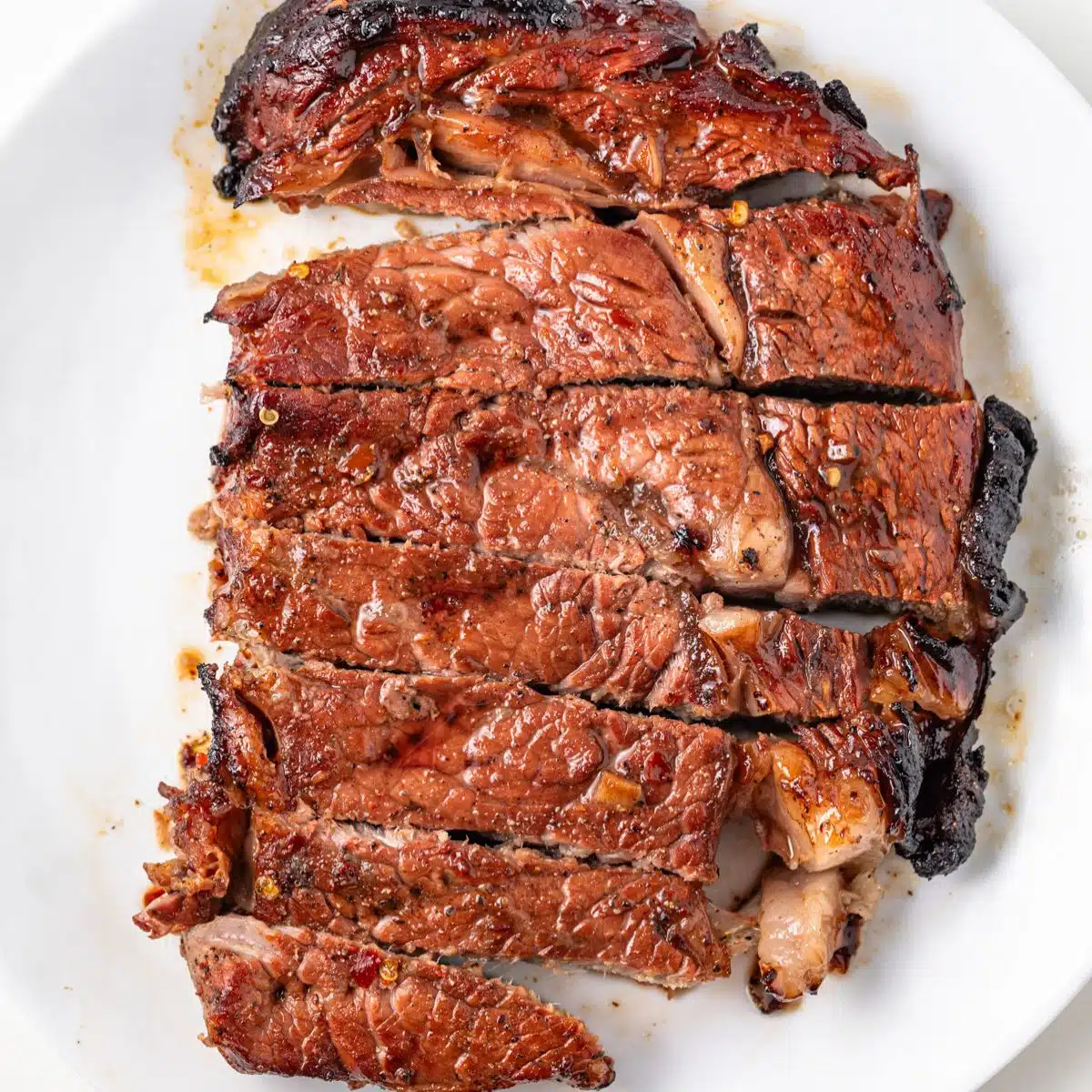 Grilled steaks marinated in spicy steak marinade.