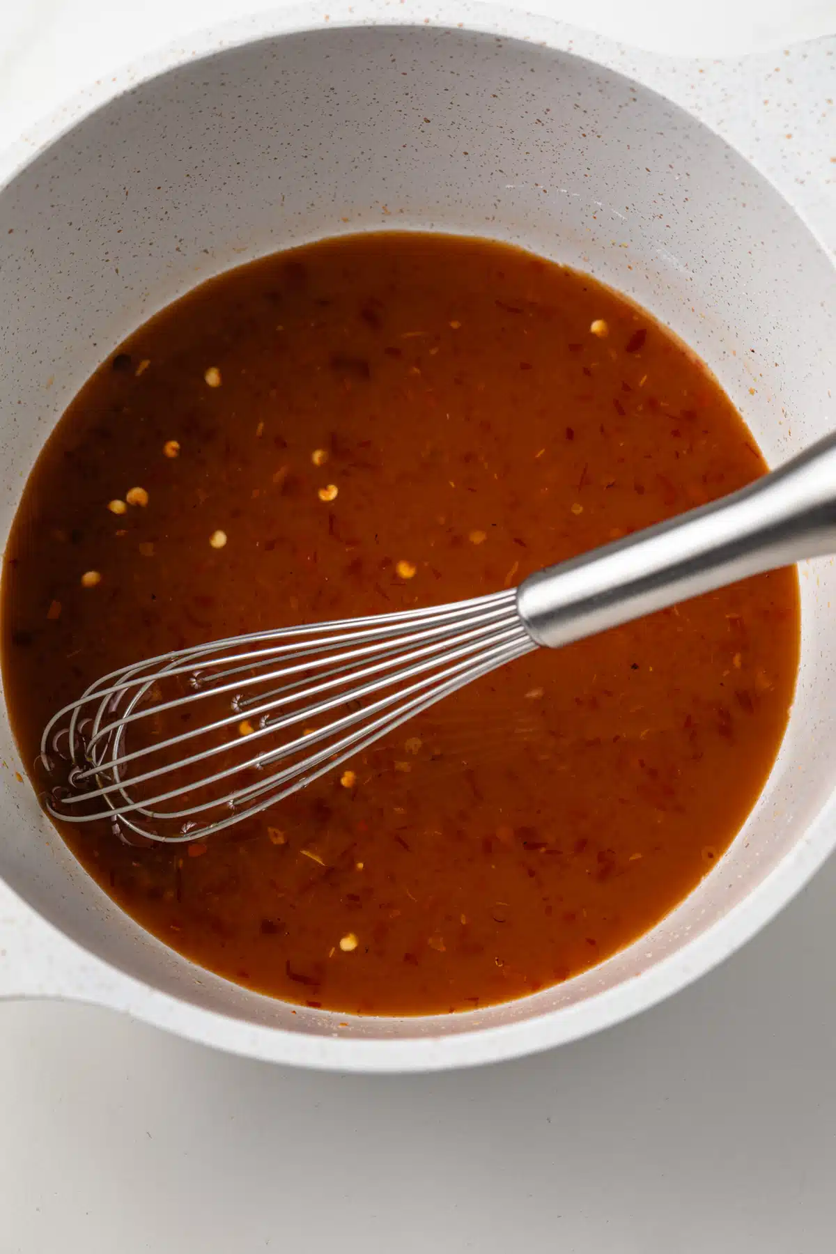 Ingredients for general tso sauce in a sauce pan.