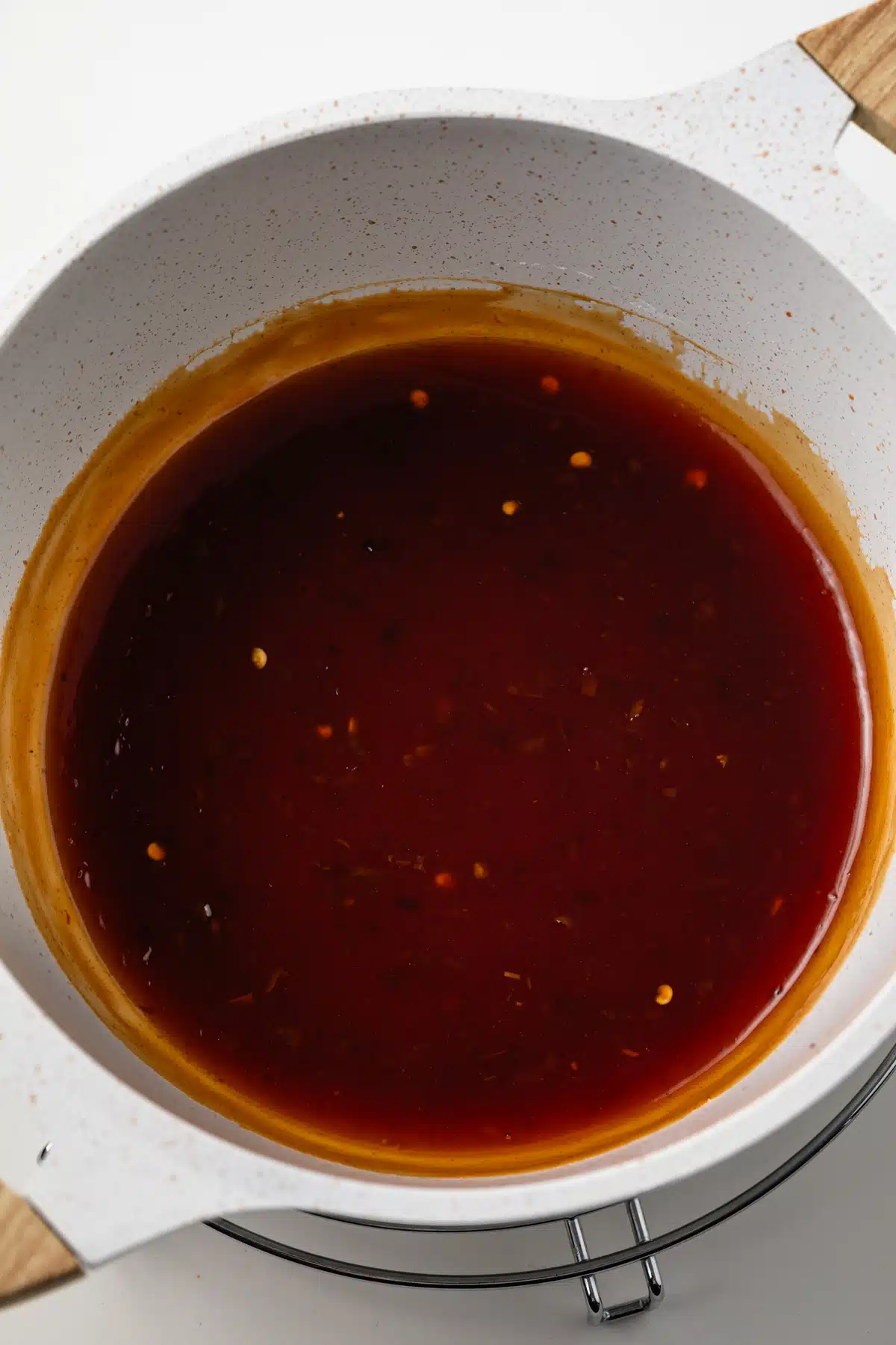 General tso sauce in a sauce pan.