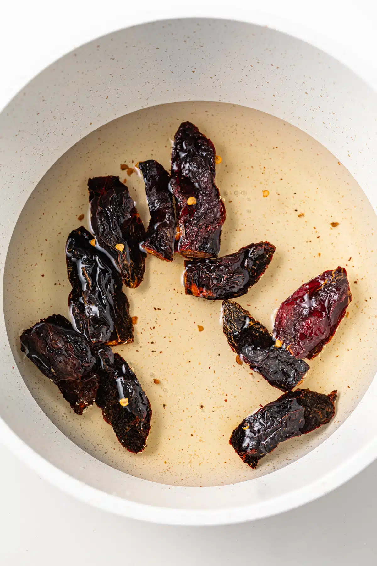 Dried chipotle peppers in water.