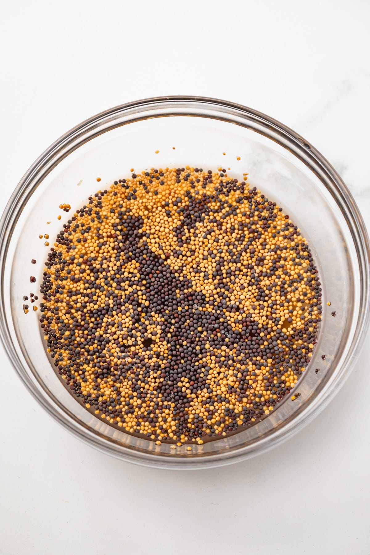 Mustard seeds in vinegar.