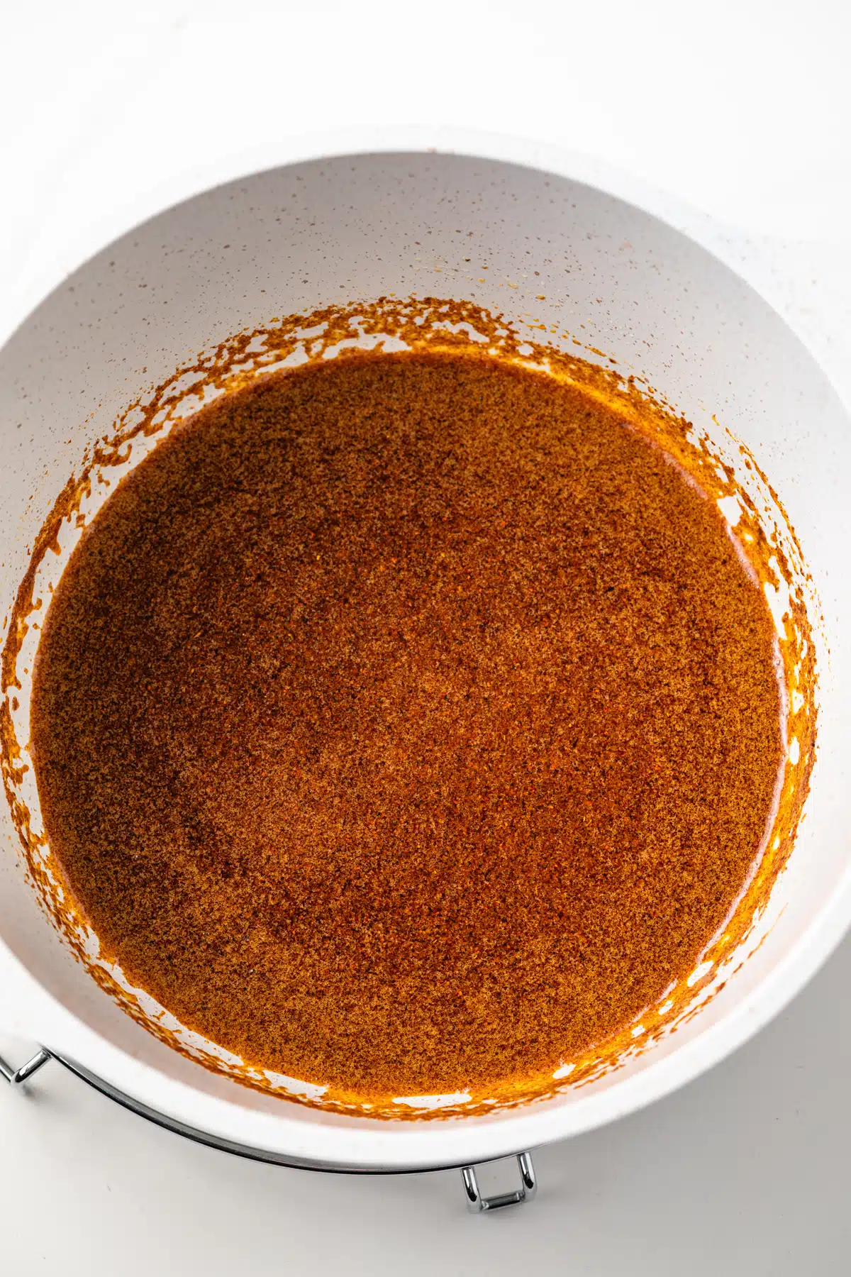 Nashville hot sauce in a saucepan.