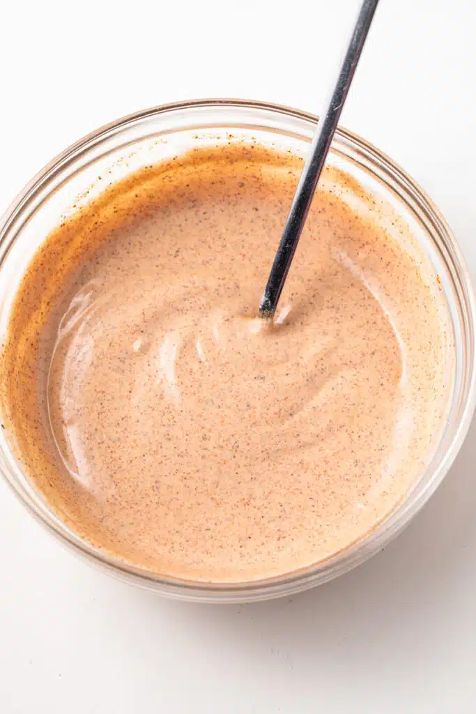 Creamy southwest salad dressing in a glass bowl.