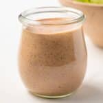 Creamy southwest salad dressing in a glass jar.