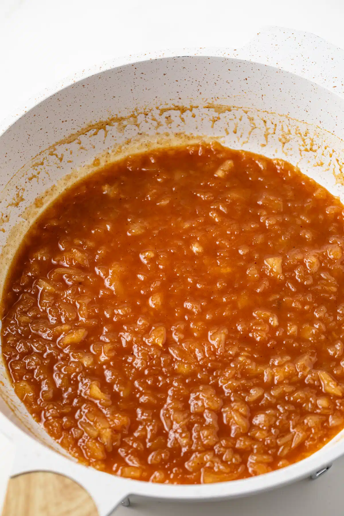 Pineapple glaze for ham in a sauce pan.