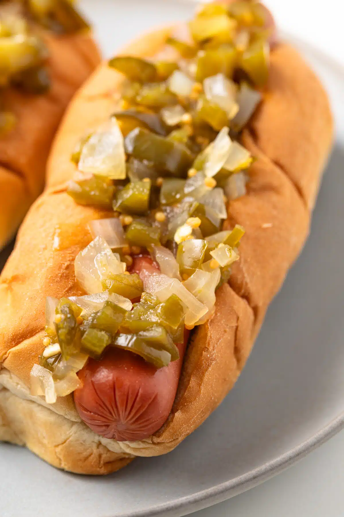 Close up of hot dogs with hot pepper relish.