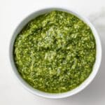 Pesto genovese in a white bowl.