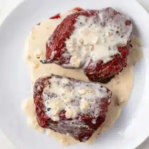 Sherry cream sauce over sirloin steaks.