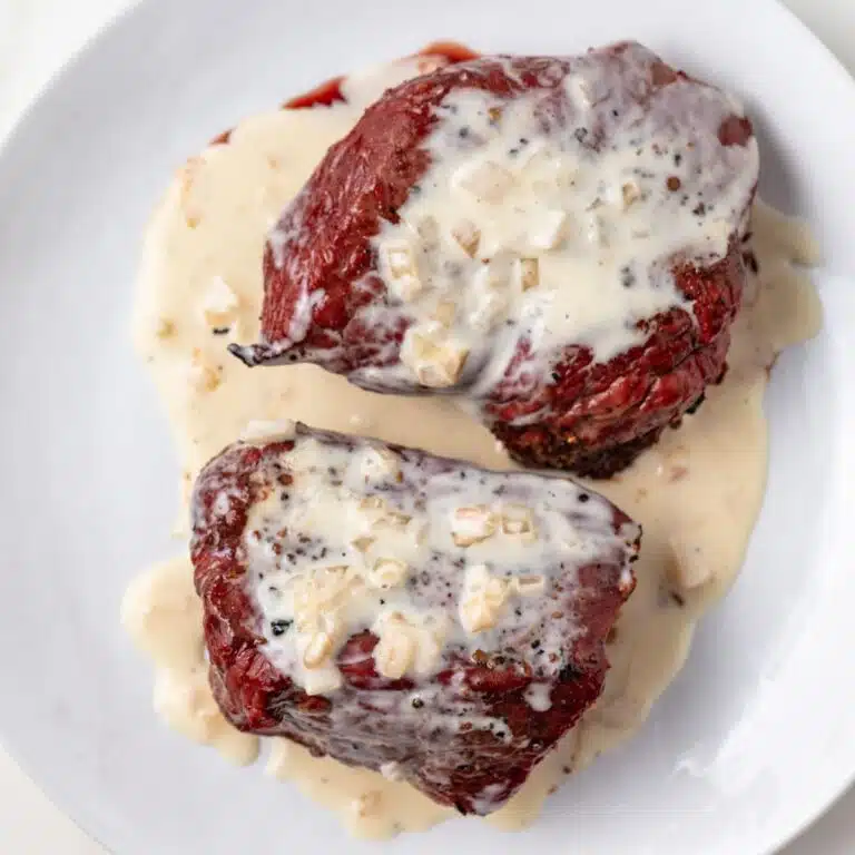 Sherry cream sauce over sirloin steaks.