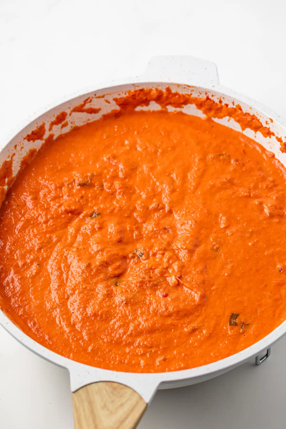 Tomato basil cream sauce in a sauce pan.