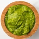 Thai green curry paste in a wooden bowl.